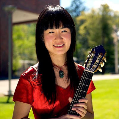 Southern Oregon University Music Student with Guitar
