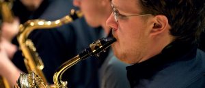 Southern Oregon University Music Jazz Ensemble Student laying Saxophone