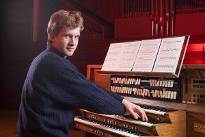 Southern Oregon University Honors College Student Playing Organ