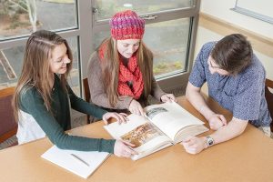 Southern Oregon University Honors College Students Studying in Library