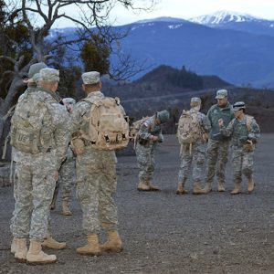 Military Science Students in the Field Running Practice Mission