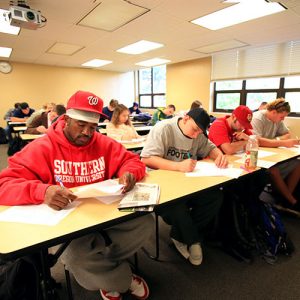Business Students Taking Test in Classroom