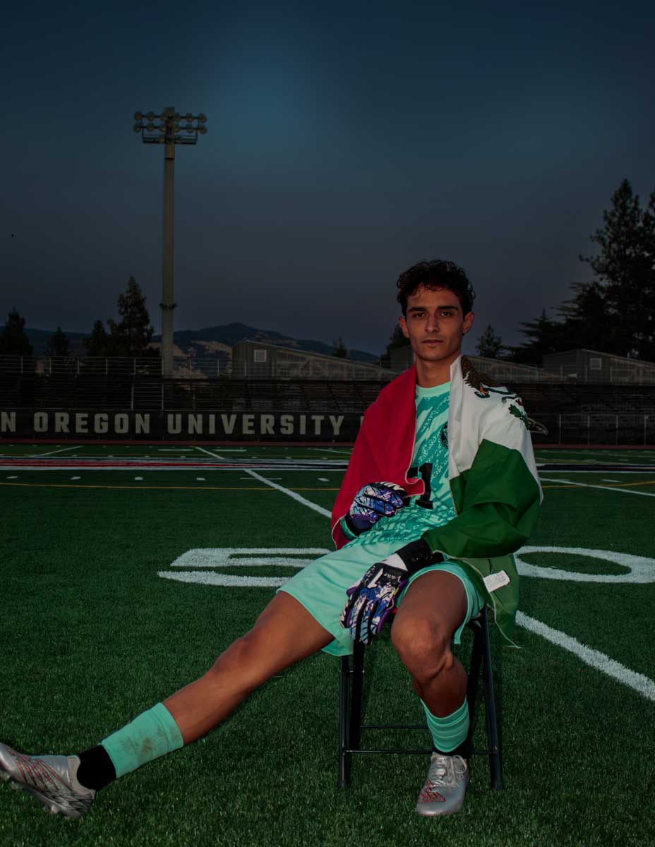 Daniel Espinosa Santillana on the field with flag