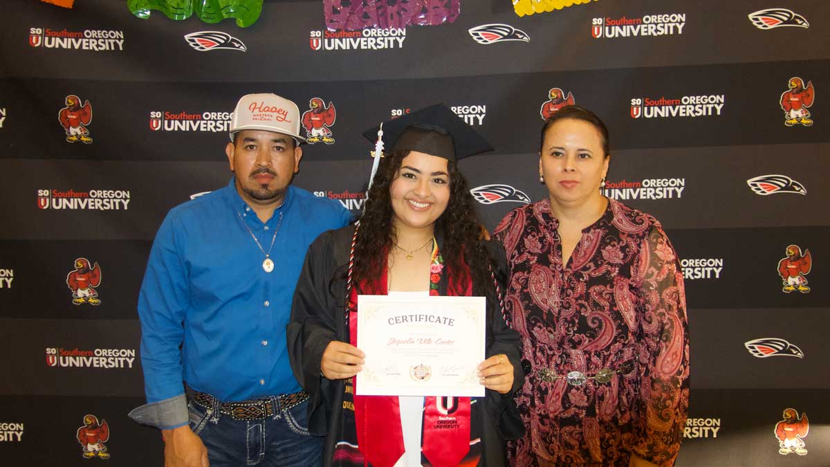 SOU Graduate with family